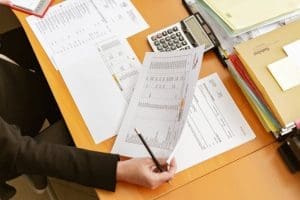 Lawyer reviewing DBA claims paperwork