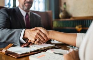 qui tam lawyer shaking hands